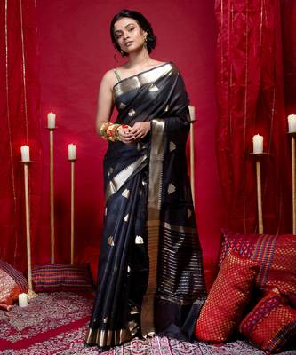 Banarasi kora organza saree in black color with triangle zari motifs and border 1