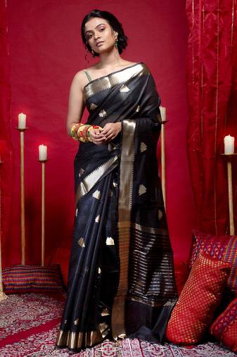 Banarasi kora organza saree in black color with triangle zari motifs and border