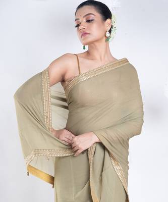Georgette saree with olive green color with golden embroidered border 2