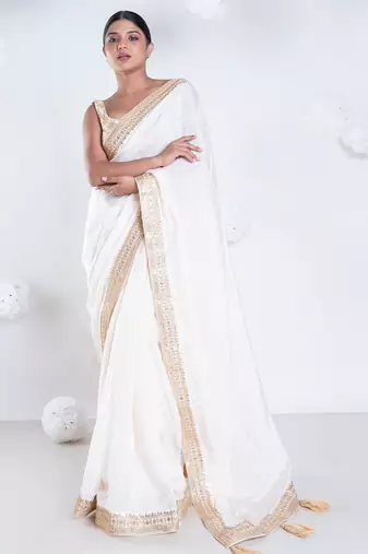 Habutai silk saree with ivory color with golden embroidered border