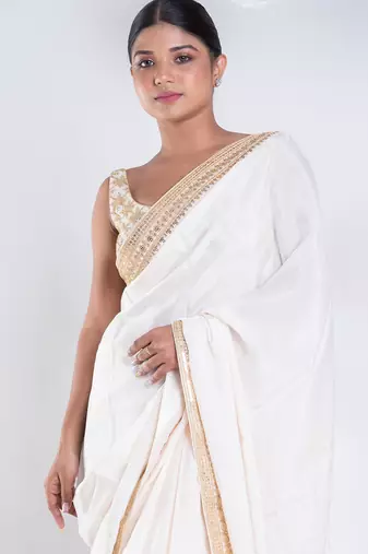 Habutai silk saree with ivory color with golden embroidered border
