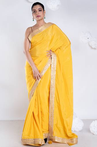 Habutai silk saree with yellow color with golden embroidered border