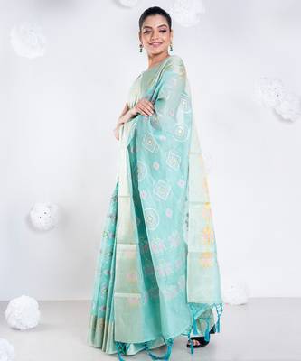 Banrasi kora organza saree in green color with multicolor abstract motifs and zari border 2