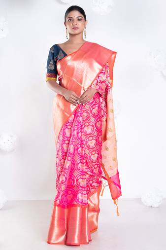 Banarasi kora cotton in sunset pink saree with patola elephant motis and contrasting border