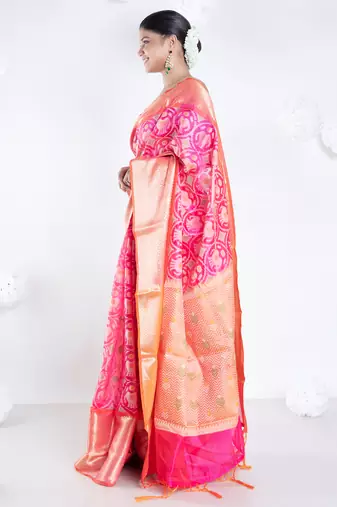 Banarasi kora cotton in sunset pink saree with patola elephant motis and contrasting border