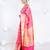 Banarasi kora cotton in sunset pink saree with patola elephant motis and contrasting border