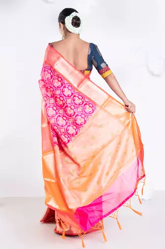 Banarasi kora cotton in sunset pink saree with patola elephant motis and contrasting border