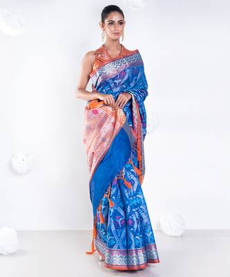 Varanasi chanderi saree in blue color with tree motifs and golden border 1