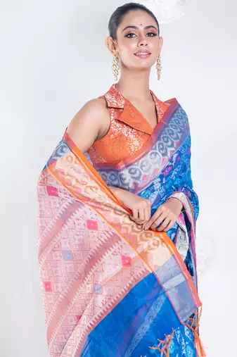 Varanasi chanderi saree in blue color with tree motifs and golden border