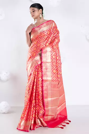 Varanasi chanderi saree in red color with tree motifs and golden border