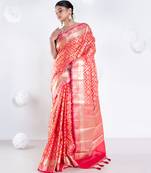 Varanasi chanderi saree in red color with tree motifs and golden border