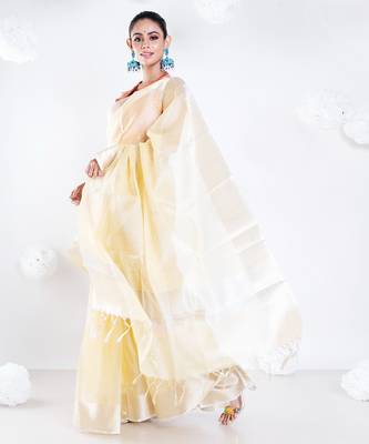 Banarasi chanderi saree in vintage yellow color with zari border 1
