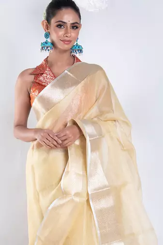 Banarasi chanderi saree in vintage yellow color with zari border