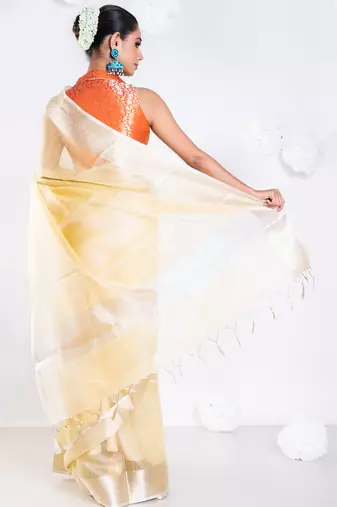 Banarasi chanderi saree in vintage yellow color with zari border