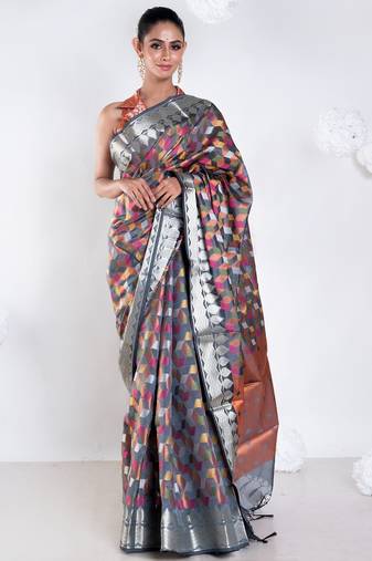 Banarasi kora organza saree in grey color with multicolor motifs with copper zari