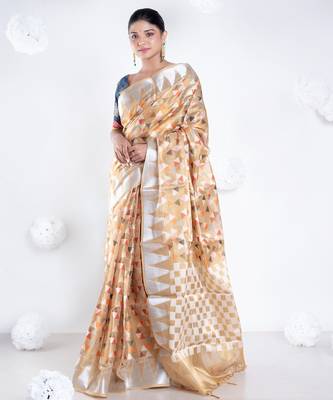 Banarasi kora organza saree in mud yellow color with multicolor motifs with copper zari 1