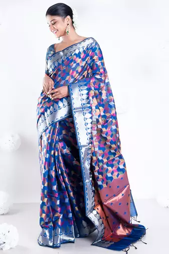 Banarasi kora organza saree in navy blue color with multicolor motifs with copper zari