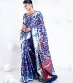 Banarasi kora organza saree in navy blue color with multicolor motifs with copper zari