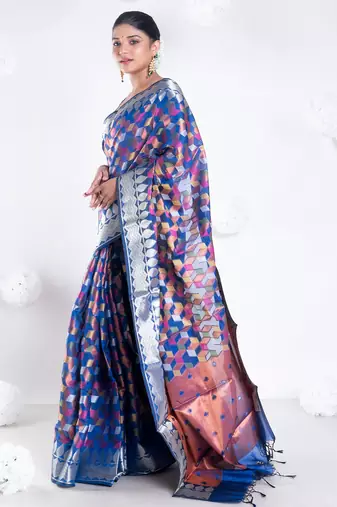 Banarasi kora organza saree in navy blue color with multicolor motifs with copper zari