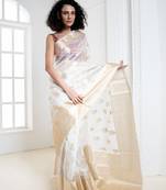 Offwhite Organza Silk Saree with Zari Border and Floral Motifs