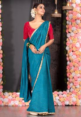 TEAL BLUE GEORGETTE SAREE WITH LUREX GOLD STRIPES AND SCALLOP EMBROIDERED BORDER 1