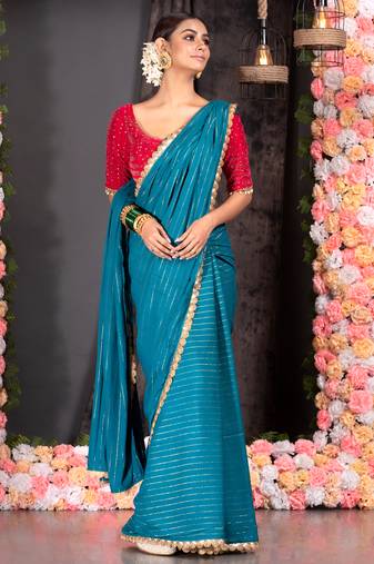 TEAL BLUE GEORGETTE SAREE WITH LUREX GOLD STRIPES AND SCALLOP EMBROIDERED BORDER
