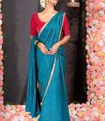 TEAL BLUE GEORGETTE SAREE WITH LUREX GOLD STRIPES AND SCALLOP EMBROIDERED BORDER