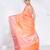 Banarasi kora organza saree in sunset orange color with golden border and booti