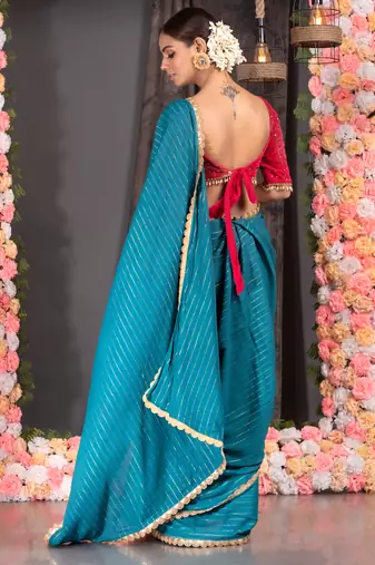 TEAL BLUE GEORGETTE SAREE WITH LUREX GOLD STRIPES AND SCALLOP EMBROIDERED BORDER