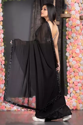 Black  georgette hand embroidered black lace with fringes on pallu