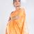 Banarasi kora organza saree in orange color with golden booti and border