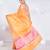 Banarasi kora organza saree in orange color with golden booti and border