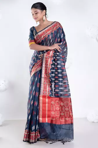 Banarasi kora saree with charcoal black color with ikkat motifs in multicolor