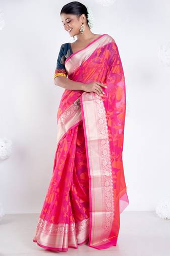 Banarasi kora cotton saree in hot pink color with floral jaal and golden border