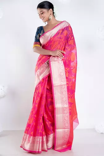 Banarasi kora cotton saree in hot pink color with floral jaal and golden border