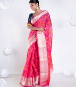 Banarasi kora cotton saree in hot pink color with floral jaal and golden border