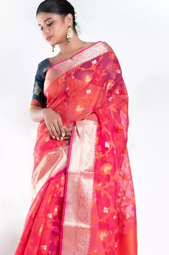Banarasi kora cotton saree in sunset red color with floral jaal and golden border