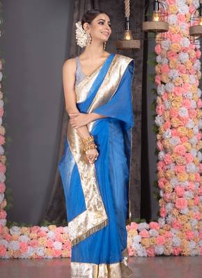 Royal blue organza saree with gold gota border and fringe lace 1
