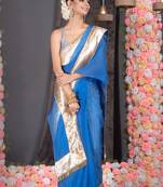 Royal blue organza saree with gold gota border and fringe lace