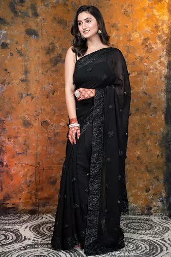 Black Georgette saree with sequin border and handmade rosette