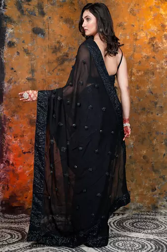 Black Georgette saree with sequin border and handmade rosette