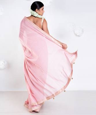 Pink color Georgette saree with golden embroidered border 4