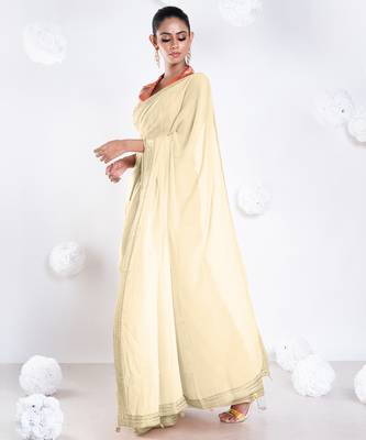Beige color Georgette saree with golden embroidered border 3