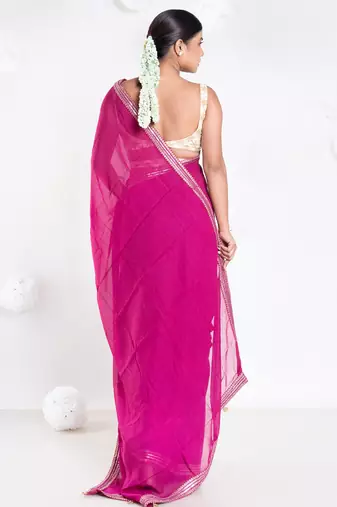 Georgette saree with pink color with golden embroidered border