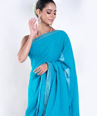 Georgette saree with blue color with golden embroidered border 2