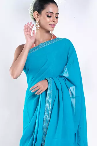 Georgette saree with blue color with golden embroidered border