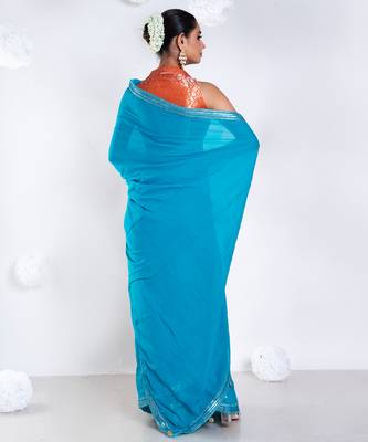 Georgette saree with blue color with golden embroidered border 4