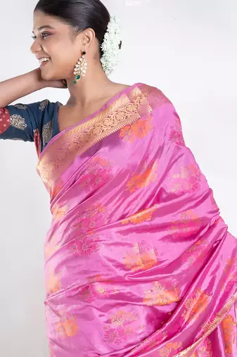 Banarasi ari silk blend saree in magenta color with multicolor motifs and zari border