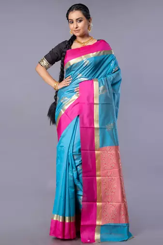 Kanjivaram saree in blue color with contravention border and zari motifs