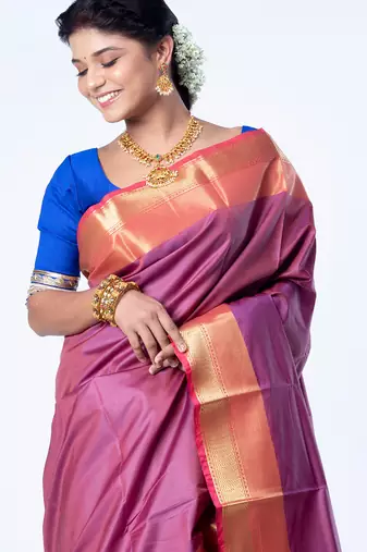 Kanjivaram saree in dark maroon color with golden mahapar border